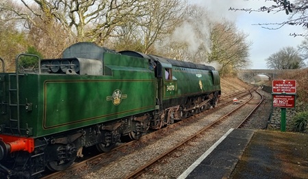 34053