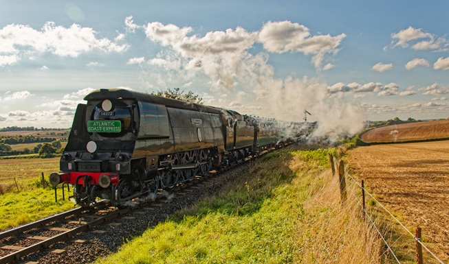 34053